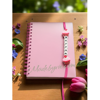 Pink notebook with beads