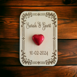 Wooden card with chocolate heart
